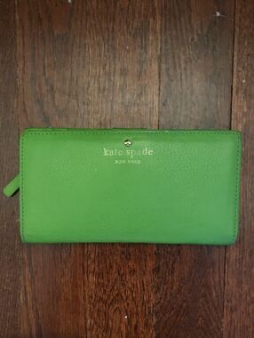 Kate Spade staci large slim bifold wallet Turaco green